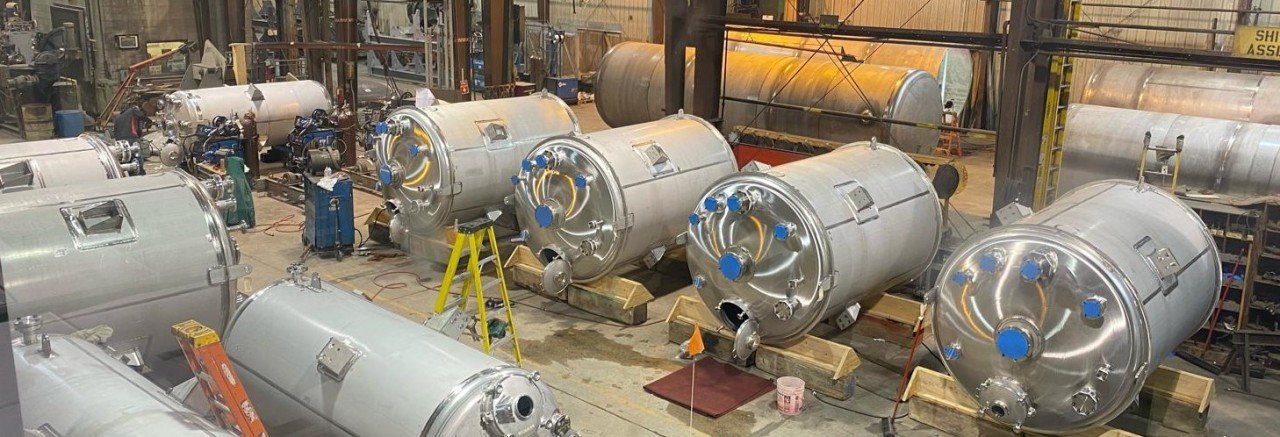 Engineer inspecting dust extraction system